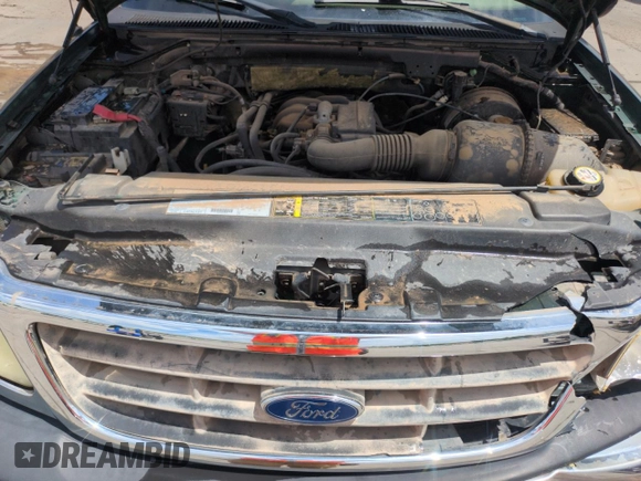 2003 Ford F-150 XL with VIN 2FTRX172X3CA58789, listed as a Copart auction lot 57986695 with 160,124 mi miles and Salvage title. Bid and sale history available at DreamBid. Image 11.
