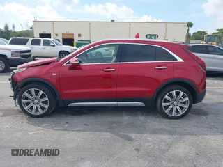 2021 Cadillac XT4 FWD Premium Luxury with VIN 1GYFZCR41MF043072, listed as a IAAI auction lot 41769251 with 31,053 mi miles. Bid and sale history available at carsss.com. Image 14.