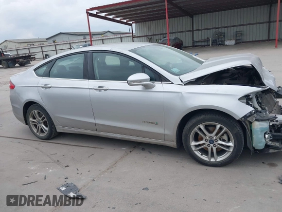 2016 Ford Fusion SE Hybrid with VIN 3FA6P0LU2GR340755, listed as a IAAI auction lot 41673932 with 191,650 mi miles. Bid and sale history available at carsss.com. Image 14.