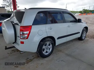 2007 Suzuki Grand Vitara XSport with VIN JS3TD944974200608, listed as a IAAI auction lot 42714438 with 185,822 mi miles and . Bid and sale history available at DreamBid. Image 4.