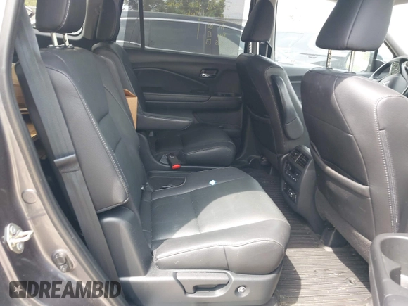 2020 Honda Pilot Elite with VIN 5FNYF6H00LB027472, listed as a IAAI auction lot 42253478 with 69,988 mi miles and . Bid and sale history available at DreamBid. Image 8.