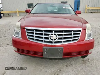 2006 Cadillac DTS 1SC z VIN 1G6KD57Y46U237570, wystawiony jako Copart lot #57211675 z przebiegiem 95 732 mil mil oraz Szkoda całkowita • Salvage title. Historia ofert i sprzedaży dostępna na DreamBid. Obrazek 5.