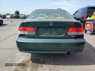 1999 Honda Civic EX with VIN 1HGEJ8243XL083130, listed as a Copart auction lot 60248885 with 331,458 mi miles and Salvage title. Bid and sale history available at DreamBid. Image 6.