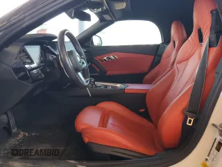 2020 BMW Z4 sDrive30i with VIN WBAHF3C0XLWW60530, listed as a Copart auction lot 57099555 with 20,464 mi miles and Salvage title. Bid and sale history available at DreamBid. Image 7.