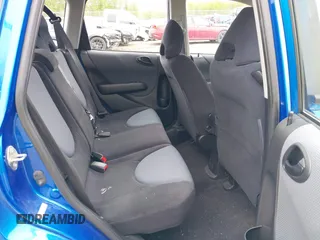 2008 Honda Fit Sport z VIN JHMGD38618S049025, wystawiony jako IAAI lot #41179396 z przebiegiem 78 371 mil mil oraz . Historia ofert i sprzedaży dostępna na DreamBid. Obrazek 8.
