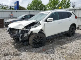 2017 Nissan Rogue SV z VIN 5N1AT2MV0HC872472, wystawiony jako Copart lot #55642035 z przebiegiem Nie podano mil oraz Szkoda całkowita • Salvage title. Historia ofert i sprzedaży dostępna na DreamBid. Obrazek 1.