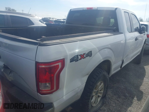 2015 Ford F-150 XLT with VIN 1FTFX1EG9FFA73603, listed as a IAAI auction lot 41851148 with Not provided miles and . Bid and sale history available at DreamBid. Image 4.