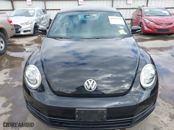 2012 Volkswagen Beetle 2.5L w/Sun/Sound/Nav PZEV with VIN 3VWHP7AT0CM623536, listed as a IAAI auction lot 41351333 with 106,600 mi miles. Bid and sale history available at carsss.com. Image 12.