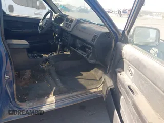 2001 Nissan Frontier 4WD SVE SuperCharger with VIN 1N6MD26Y11C368926, listed as a IAAI auction lot 41054779 with 182,621 mi miles. Bid and sale history available at carsss.com. Image 5.