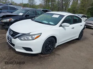 2016 Nissan Altima SL with VIN 1N4AL3AP1GC201767, listed as a IAAI auction lot 42050266 with 120,652 mi miles and . Bid and sale history available at carsss.com. Image 2.