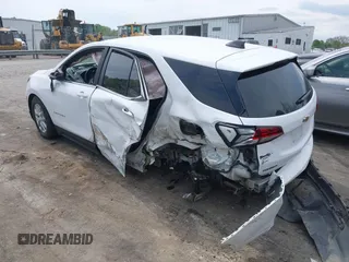 2022 Chevrolet Equinox LT z VIN 3GNAXJEV9NL132136, wystawiony jako IAAI lot #41976899 z przebiegiem 94 235 mil mil oraz . Historia ofert i sprzedaży dostępna na DreamBid. Obrazek 3.