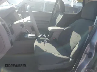 2010 Ford Escape XLS with VIN 1FMCU0C73AKA52802, listed as a Copart auction lot 60100185 with 141,541 mi miles and Clean title. Bid and sale history available at DreamBid. Image 7.
