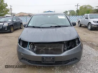 2013 Honda Odyssey EX z VIN 5FNRL5H47DB032096, wystawiony jako IAAI lot #42149190 z przebiegiem 149 836 mil mil oraz . Historia ofert i sprzedaży dostępna na DreamBid. Obrazek 12.