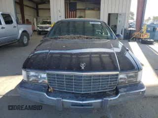 1996 Cadillac Fleetwood z VIN 1G6DW52P2TR710009, wystawiony jako Copart lot #67530934 z przebiegiem 127 910 mil mil oraz Tytuł czysty. Historia ofert i sprzedaży dostępna na DreamBid. Obrazek 5.
