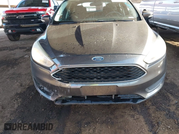 2016 Ford Focus SE with VIN 1FADP3F28GL330815, listed as a IAAI auction lot 41696821 with 125,247 mi miles. Bid and sale history available at carsss.com. Image 6.