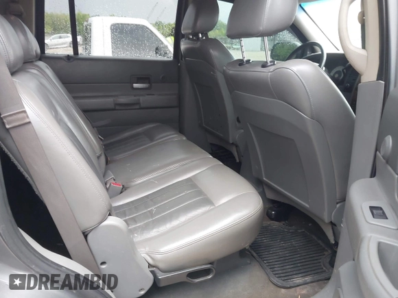 2005 Dodge Durango Limited with VIN 1D4HB58D85F582423, listed as a IAAI auction lot 42631605 with 213,601 mi miles and . Bid and sale history available at DreamBid. Image 8.