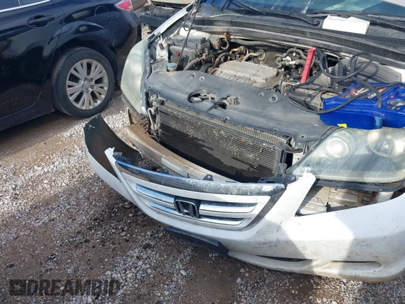 2006 Honda Odyssey EX with VIN 5FNRL38426B400952, listed as a IAAI auction lot 41346853 with 210,826 mi miles and . Bid and sale history available at DreamBid. Image 6.
