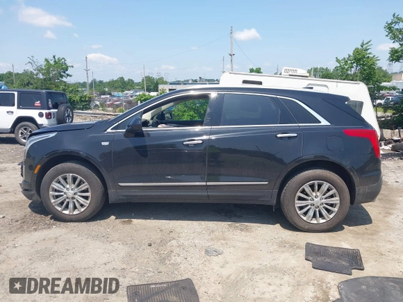 2018 Cadillac XT5 Luxury AWD z VIN 1GYKNDRS0JZ139185, wystawiony jako IAAI lot #42551426 z przebiegiem 109 699 mil mil oraz . Historia ofert i sprzedaży dostępna na DreamBid. Obrazek 14.