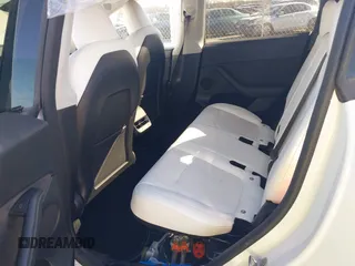 2023 Tesla Model Y Performance with VIN 7SAYGDEF1PF864976, listed as a IAAI auction lot 41667676 with Not Provided miles and . Bid and sale history available at DreamBid. Image 8.