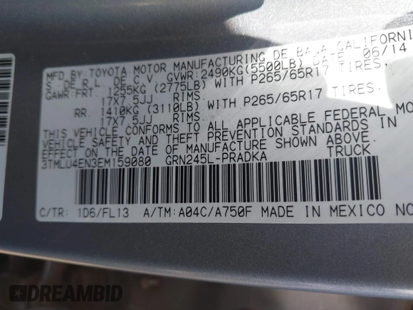 2014 Toyota Tacoma with VIN 3TMLU4EN3EM159080, listed as a IAAI auction lot 41809259 with 113,950 mi miles and . Bid and sale history available at DreamBid. Image 9.