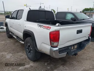 2016 Toyota Tacoma SR with VIN 5TFCZ5AN6GX006039, listed as a IAAI auction lot 41908239 with 222,939 mi miles and . Bid and sale history available at DreamBid. Image 3.
