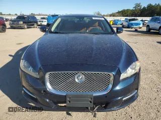 2013 Jaguar XJ with VIN SAJWA2G16DLV50973, listed as a Copart auction lot 82555074 with 148,956 mi miles and Salvage Title. Bid and sale history available at carsss.com. Image 5.