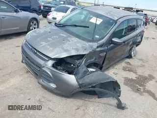 2014 Ford Escape SE z VIN 1FMCU9GX9EUC01478, wystawiony jako IAAI lot #42370409 z przebiegiem 158 154 mil mil oraz . Historia ofert i sprzedaży dostępna na DreamBid. Obrazek 2.