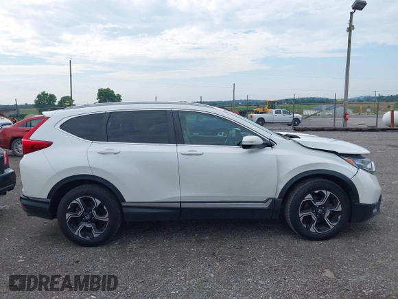 2018 Honda CR-V Touring with VIN 2HKRW2H91JH665241, listed as a IAAI auction lot 42638694 with 62,066 mi miles and . Bid and sale history available at DreamBid. Image 13.