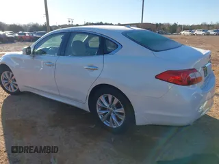 2011 Infiniti M37 with VIN JN1BY1AP5BM323915, listed as a IAAI auction lot 41822773 with 184,129 mi miles. Bid and sale history available at carsss.com. Image 3.
