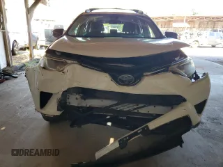 2017 Toyota RAV4 LE with VIN JTMBFREV7HJ148815, listed as a Copart auction lot 82632724 with 24,775 mi miles and Salvage Title. Bid and sale history available at DreamBid. Image 5.