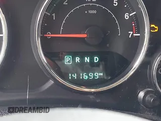 2014 Jeep Wrangler Unlimited Sport with VIN 1C4BJWDG4EL319259, listed as a IAAI auction lot 41494299 with 141,699 mi miles. Bid and sale history available at carsss.com. Image 15.