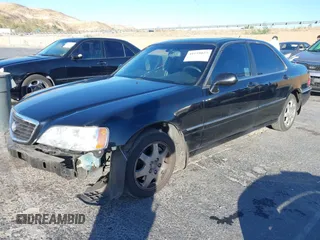 2002 Acura RL с VIN JH4KA96592C000849, выставлен на аукционе IAAI как лот 41159027 с пробегом Не указан миль и . История ставок и продаж доступна на DreamBid. Изображение 2.