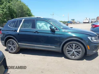2018 Volkswagen Tiguan SEL with VIN 3VV2B7AX9JM058518, listed as a IAAI auction lot 42558129 with 82,807 mi miles and . Bid and sale history available at DreamBid. Image 13.