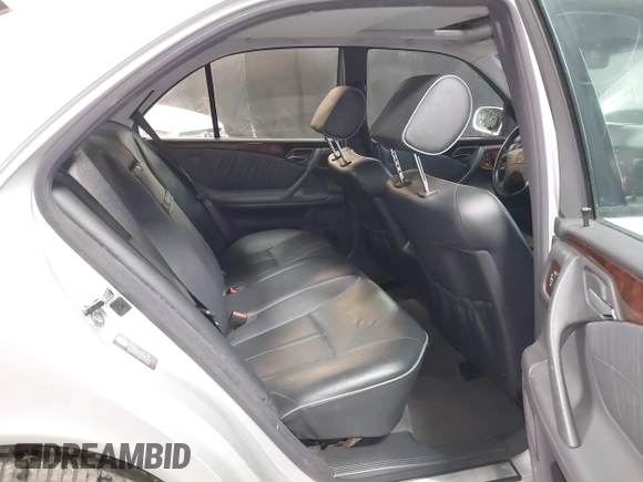 2002 Mercedes-Benz E-Class with VIN WDBJF82J52X062526, listed as a IAAI auction lot 41192641 with 126,352 mi miles. Bid and sale history available at carsss.com. Image 8.