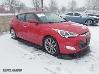 2014 Hyundai Veloster with VIN KMHTC6AD8EU214612, listed as a IAAI auction lot 41258820 with 61,984 mi miles. Bid and sale history available at carsss.com. Image 1.