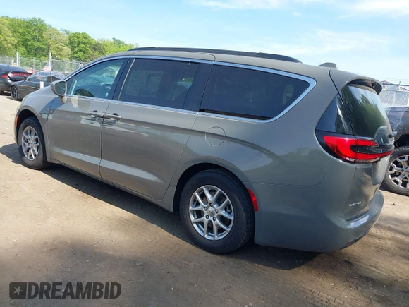 2022 Chrysler Pacifica Touring L with VIN 2C4RC1BG3NR168565, listed as a IAAI auction lot 42150290 with 61,750 mi miles and . Bid and sale history available at DreamBid. Image 3.
