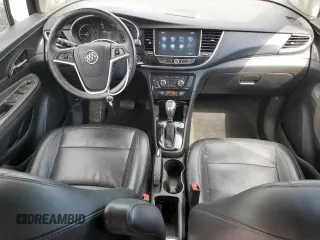 2017 Buick Encore Essence with VIN KL4CJCSB4HB058035, listed as a Copart auction lot 52089365 with 64,194 mi miles and Salvage Title. Bid and sale history available at carsss.com. Image 8.