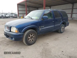 2000 GMC Jimmy SLE Convenience with VIN 1GKDT13W8Y2340743, listed as a IAAI auction lot 41393906 with 196,520 mi miles. Bid and sale history available at carsss.com. Image 2.