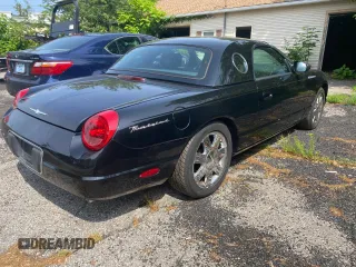 2002 Ford Thunderbird Hardtop Premium с VIN 1FAHP60A32Y114563, выставлен на аукционе Copart как лот 61160805 с пробегом 147 234 миль миль и Чистый • Clean title. История ставок и продаж доступна на DreamBid. Изображение 4.