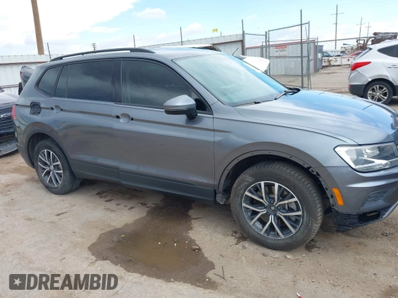 2021 Volkswagen Tiguan S with VIN 3VV0B7AX0MM017433, listed as a IAAI auction lot 42017125 with 54,624 mi miles and . Bid and sale history available at DreamBid. Image 6.
