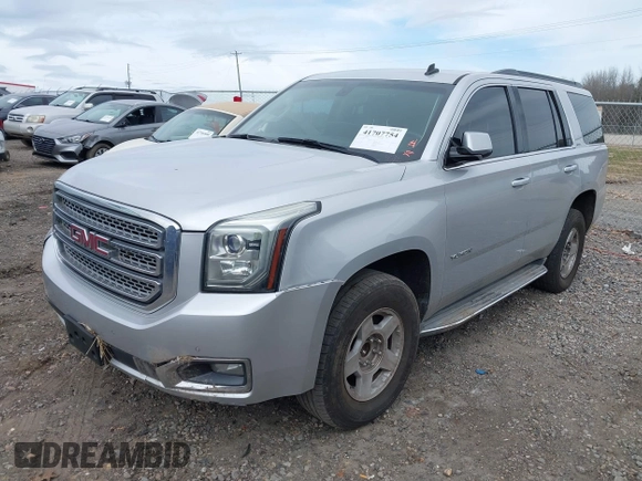 2015 GMC Yukon SLE with VIN 1GKS1AKC8FR201818, listed as a IAAI auction lot 41707754 with 193,100 mi miles. Bid and sale history available at carsss.com. Image 2.