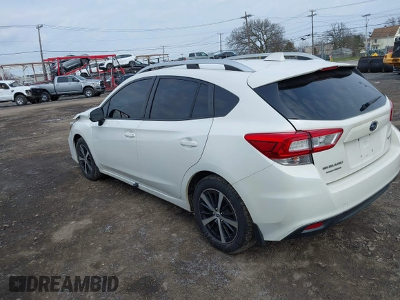 2019 Subaru Impreza Premium with VIN 4S3GTAC62K3704035, listed as a IAAI auction lot 42025822 with 76,067 mi miles and . Bid and sale history available at DreamBid. Image 3.