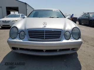 2000 Mercedes-Benz CLK 320/430 with VIN WDBLJ70G9YF144900, listed as a Copart auction lot 65674994 with 217,318 mi miles and Salvage Title. Bid and sale history available at DreamBid. Image 5.