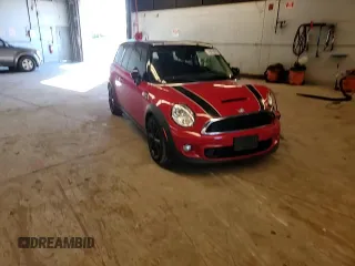 2014 MINI Clubman S z VIN WMWZG3C52ET800765, wystawiony jako Copart lot #76470874 z przebiegiem 103 971 mil mil oraz Szkoda całkowita • Salvage title. Historia ofert i sprzedaży dostępna na DreamBid. Obrazek 11.