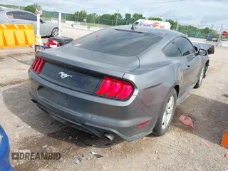 2021 Ford Mustang EcoBoost with VIN 1FA6P8TH9M5133781, listed as a IAAI auction lot 42158034 with 31,648 mi miles and . Bid and sale history available at DreamBid. Image 4.