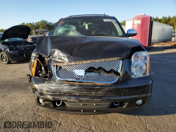 2011 GMC Yukon SLT with VIN 1GKS1CE01BR391954, listed as a Copart auction lot 82570594 with 0 mi miles and Salvage Title. Bid and sale history available at carsss.com. Image 5.