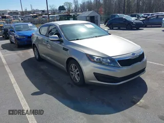 2011 Kia Optima LX with VIN KNAGM4A70B5081042, listed as a IAAI auction lot 41835721 with 203,609 mi miles and . Bid and sale history available at carsss.com. Image 1.