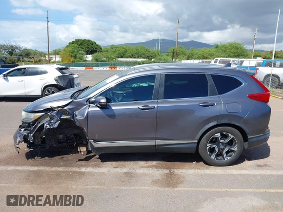 2018 Honda CR-V Touring with VIN 7FARW1H90JE030766, listed as a IAAI auction lot 41637900 with Not Provided miles and . Bid and sale history available at DreamBid. Image 14.
