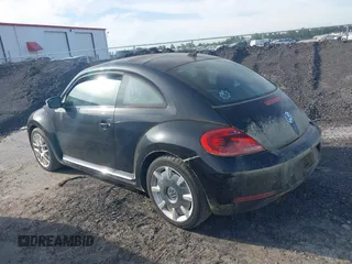 2013 Volkswagen Beetle 2.5L with VIN 3VWJP7AT1DM608370, listed as a IAAI auction lot 42088900 with Not Provided miles and . Bid and sale history available at DreamBid. Image 14.