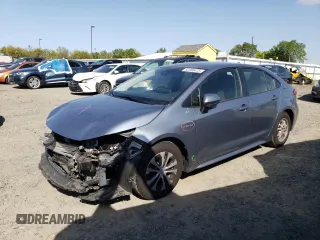 2020 Toyota Corolla Hybrid LE with VIN JTDEBRBE5LJ026587, listed as a Copart auction lot 52260475 with 102,125 mi miles and Salvage Title. Bid and sale history available at carsss.com. Image 1.